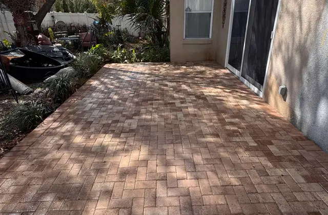 Hardscaping project with retaining wall and paver patio in Lake County, FL